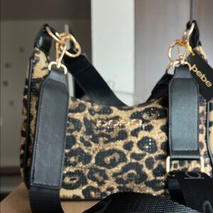 Bebe Leopard Print Shoulder Bag with Black and Gold Accents